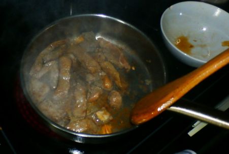 Stir-frying the steak